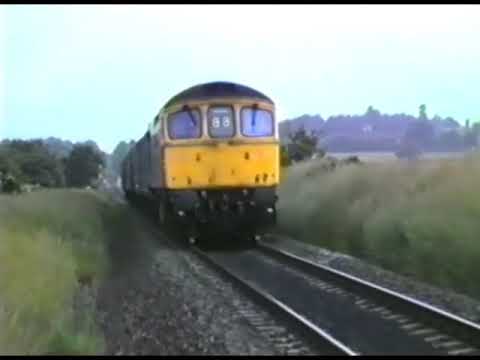 33116 passes Gibbet Hill with a parcels train