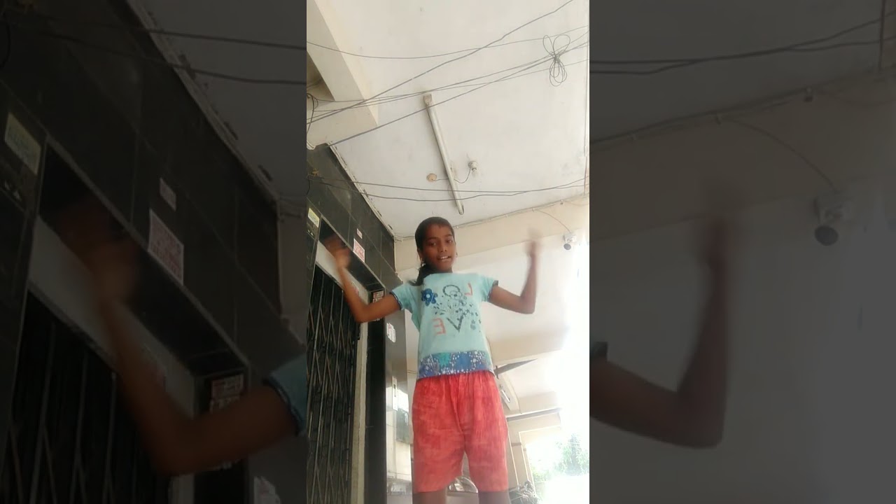 a small girl doing belly dance