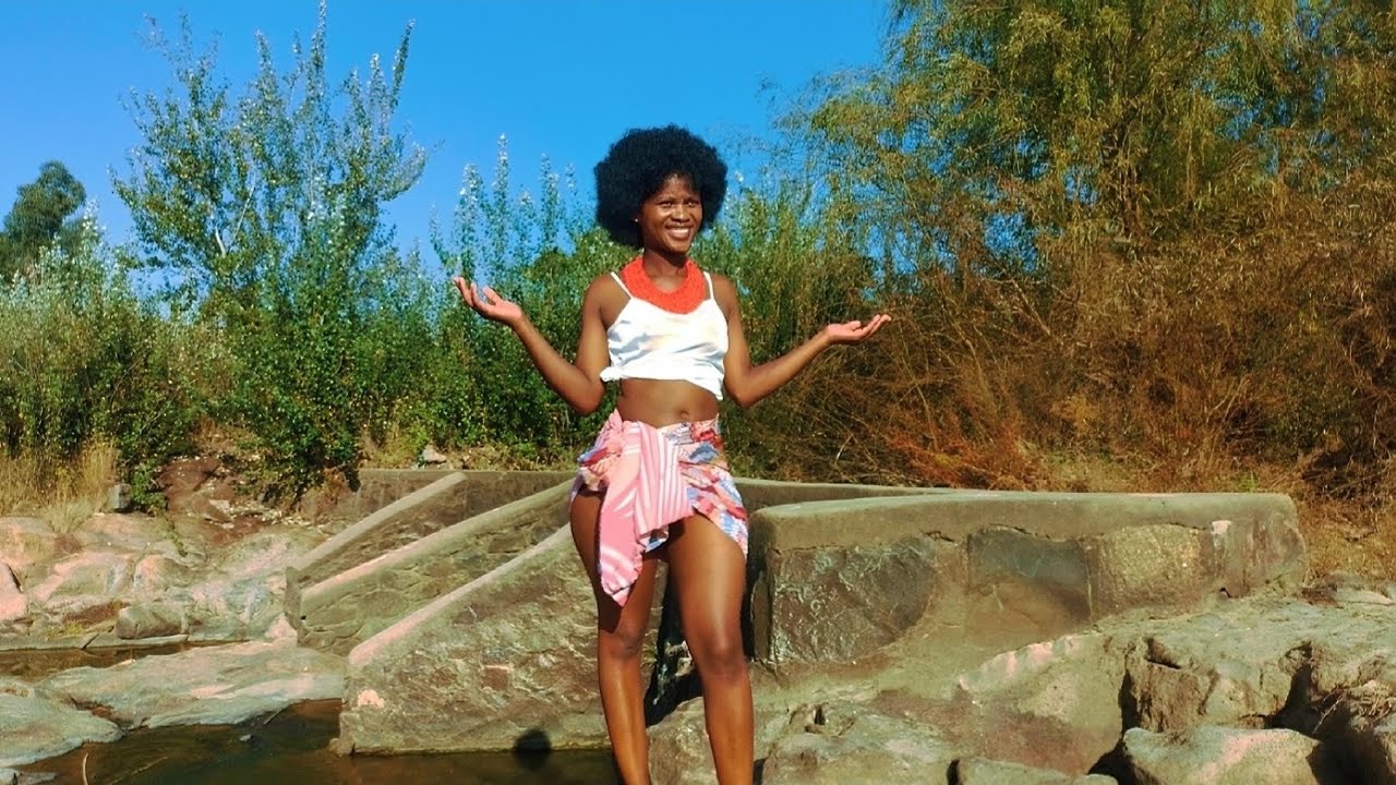 African Zulu Girl in the River