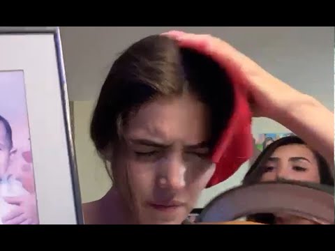 Andrea accidentally hits Alex in the head.