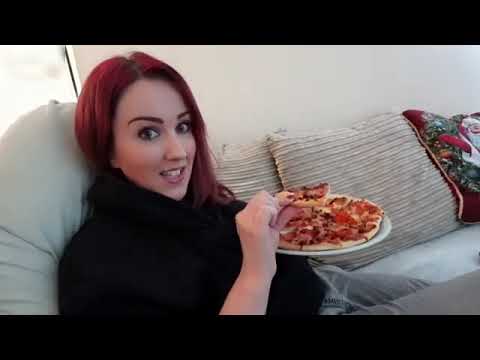 Beautiful gassy girl farting while eating pizza - girl fart