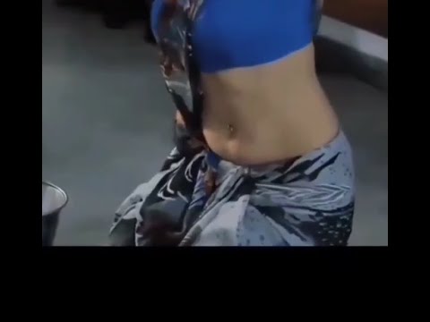Beautiful maid shows off her pierced navel in saree #youtubeshorts