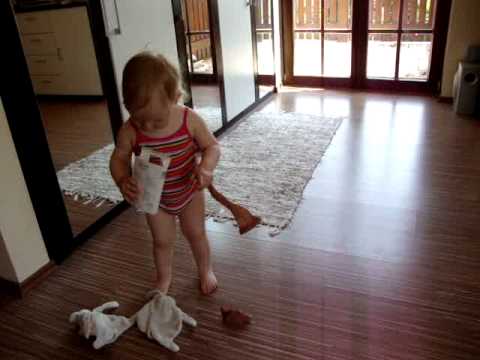 Daniella`s enjoying walking barefoot in her striped `kombidress`
