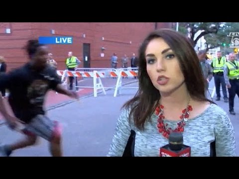 Demonstrator takes Confederate flag on live TV