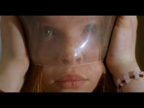 Girl blows up condom on her head from film 