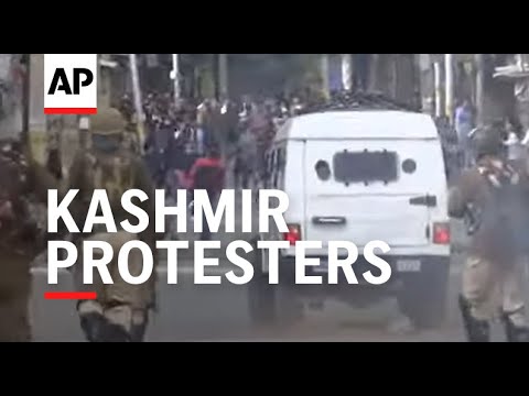 Kashmiri protesters and Indian security forces trade stones and tear gas