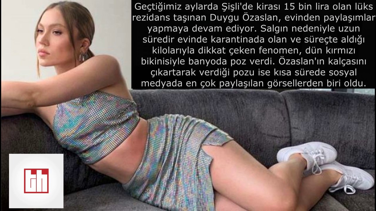 KIRMIZI CÜRETKAR BİKİNİSİYLE POZ VEREN DUYGU ÖZASLAN
