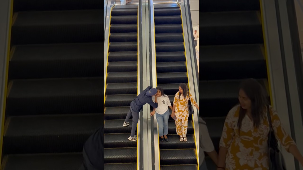 Kissing prank 😍 on Escalator #shhorts #shortsfeed #shortsvideo #entertainment  #prankvideo #funny