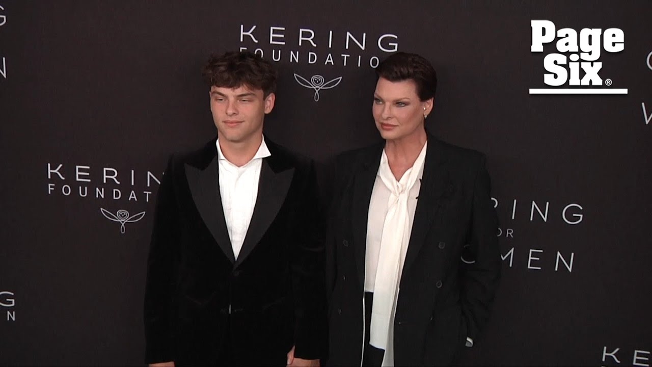 Linda Evangelista twins with 16-year-old son Augustin in suits for charity event