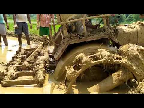 Mahindra b275 di stucked in mud