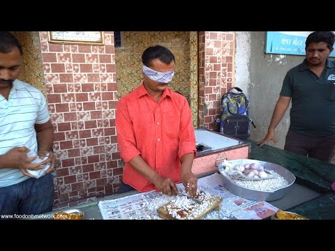 Man Cuts Onion Faster Than a Blender with Blindfold On