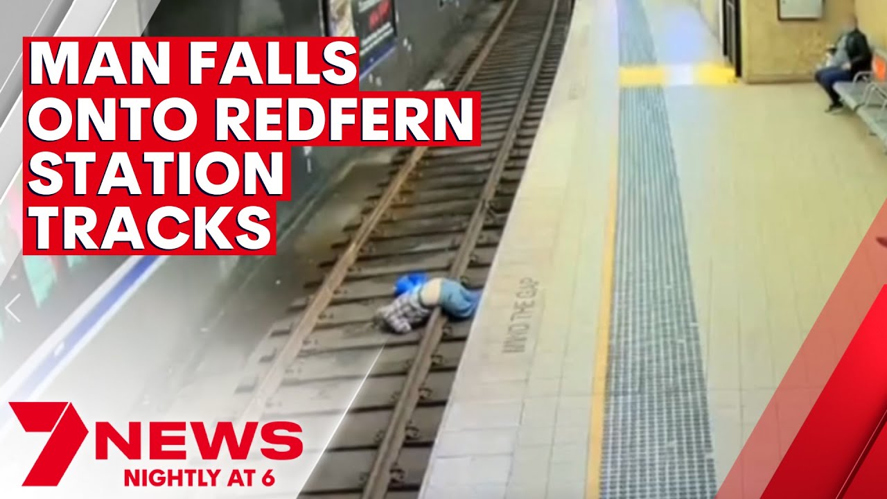 Man falls onto Redfern Station tracks | 7NEWS