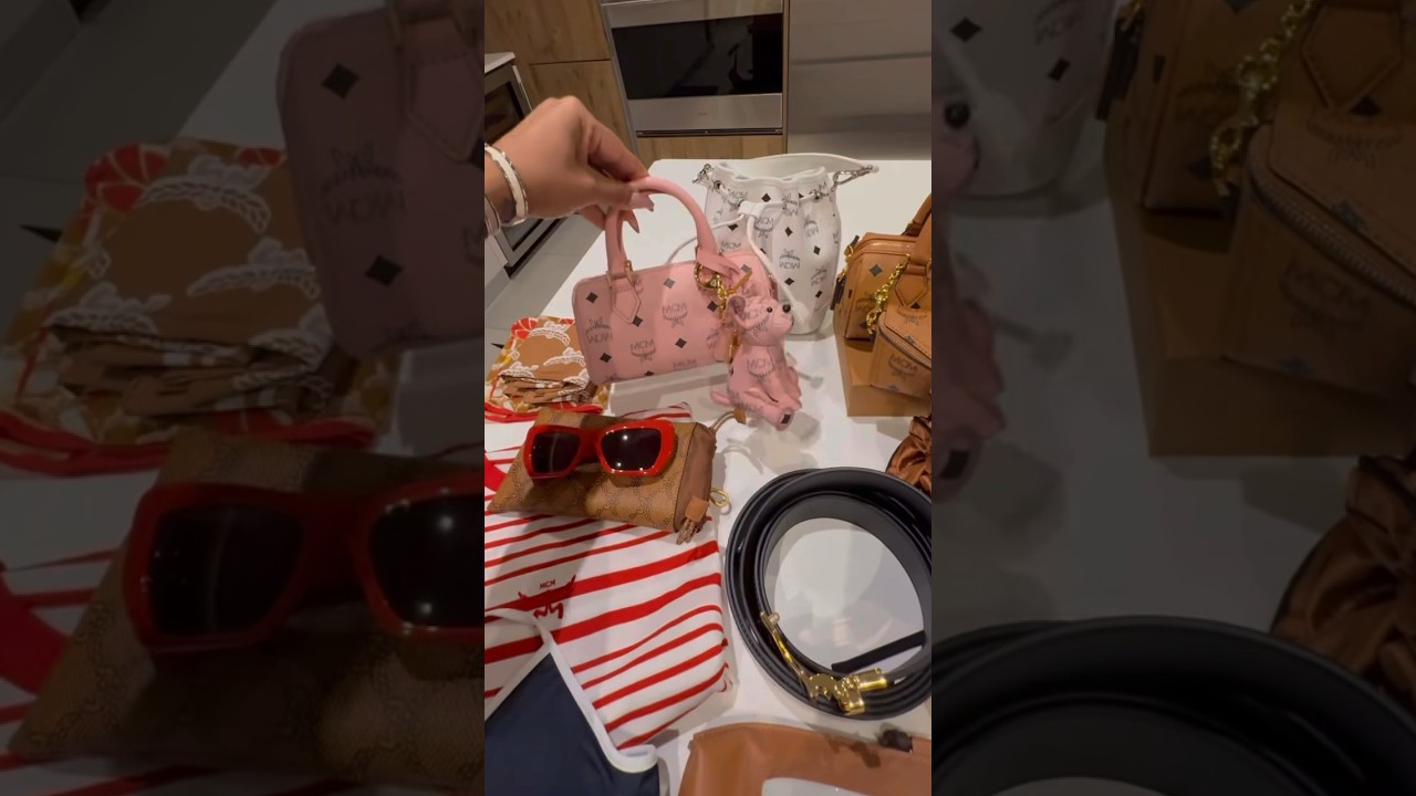 MCM sends Yung Miami designer bags shades and belts