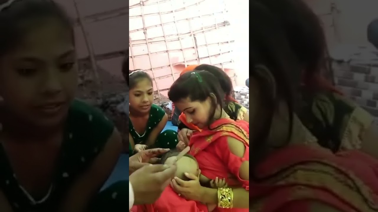 Mom Breast feeding at Mundan #breastfeeding #breastmilk #mundanceremony #breast