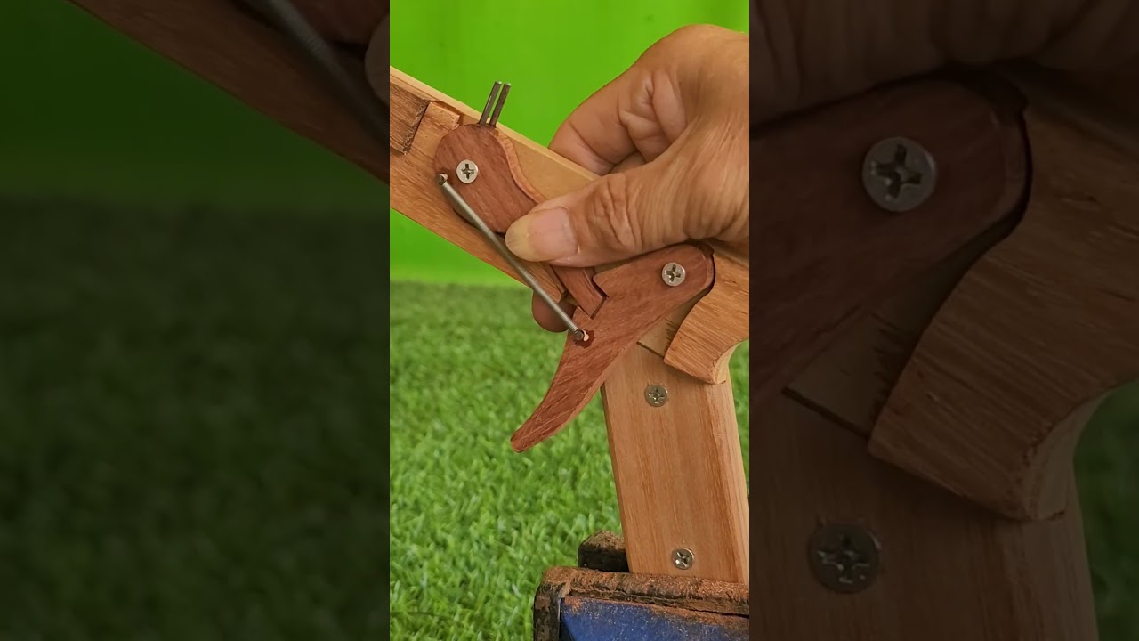 New mechanism wooden slingshot#woodscraft #carpentry #wood #wooddesigner #tools