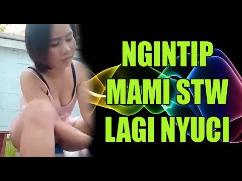 NGINTIP TANTE STW  LAGI NYUCI