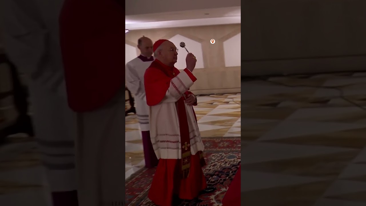 Pope Francis lies in open casket