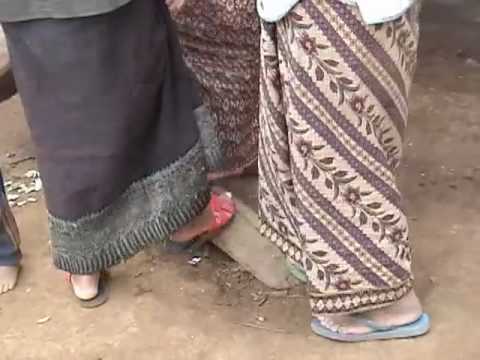 Pounding sugar cane