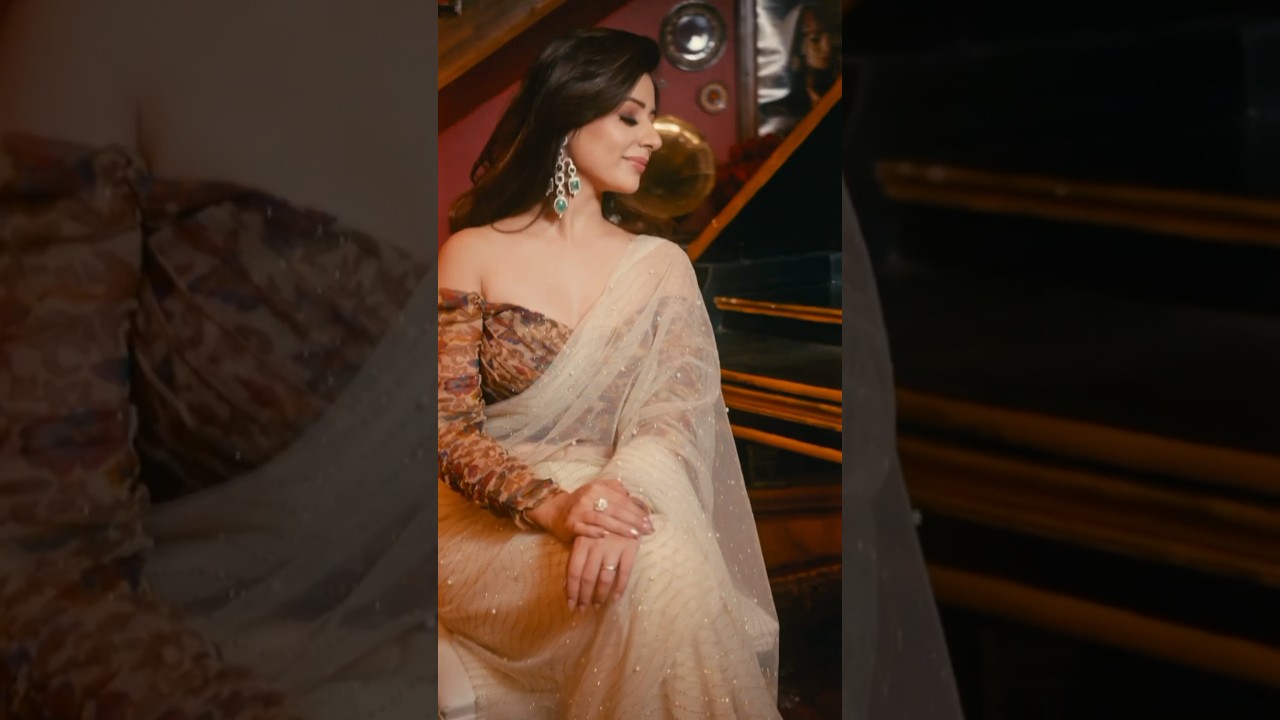 Punjabi actress #tania wearing - komalsandhu multi colour blouse & glitter beige cream saree 🔥