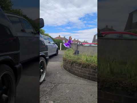 putting the bins out in my new purple satin sissy maids dress