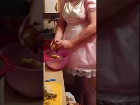 Sissy Maid is working in the kitchen.