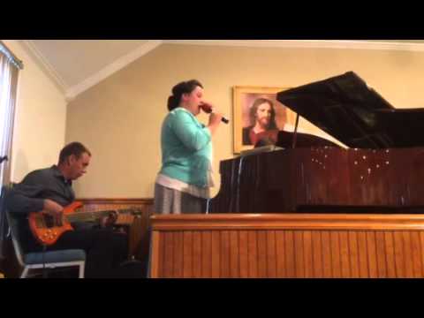Sister Faith singing in Newton