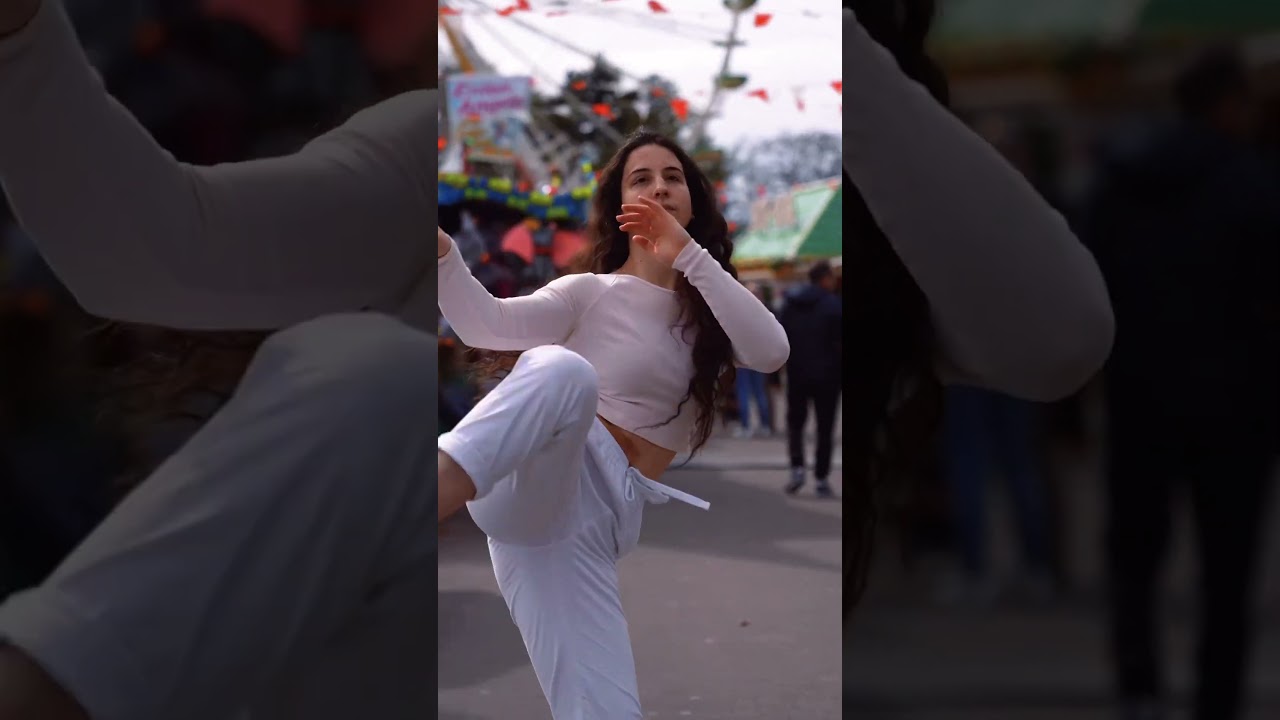 Taekwondo girl practices her kicks #taekwondogirl #highkick #flexible #festival