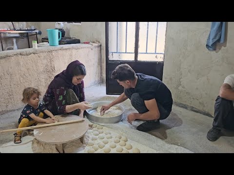 Zarigol baking bread and Ali helping her: A happy couple